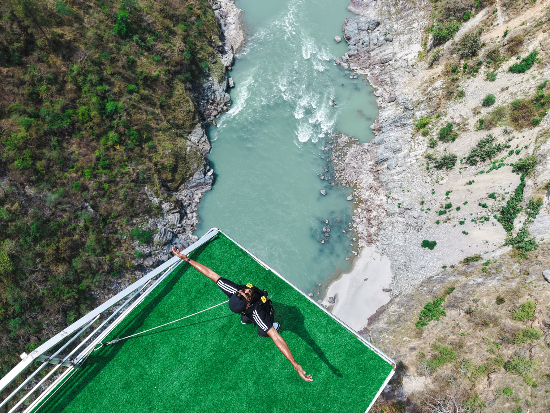 Aerial view of the cliff-top bungee platform above the Ganga river gorge at Shivpuri Rishikesh
