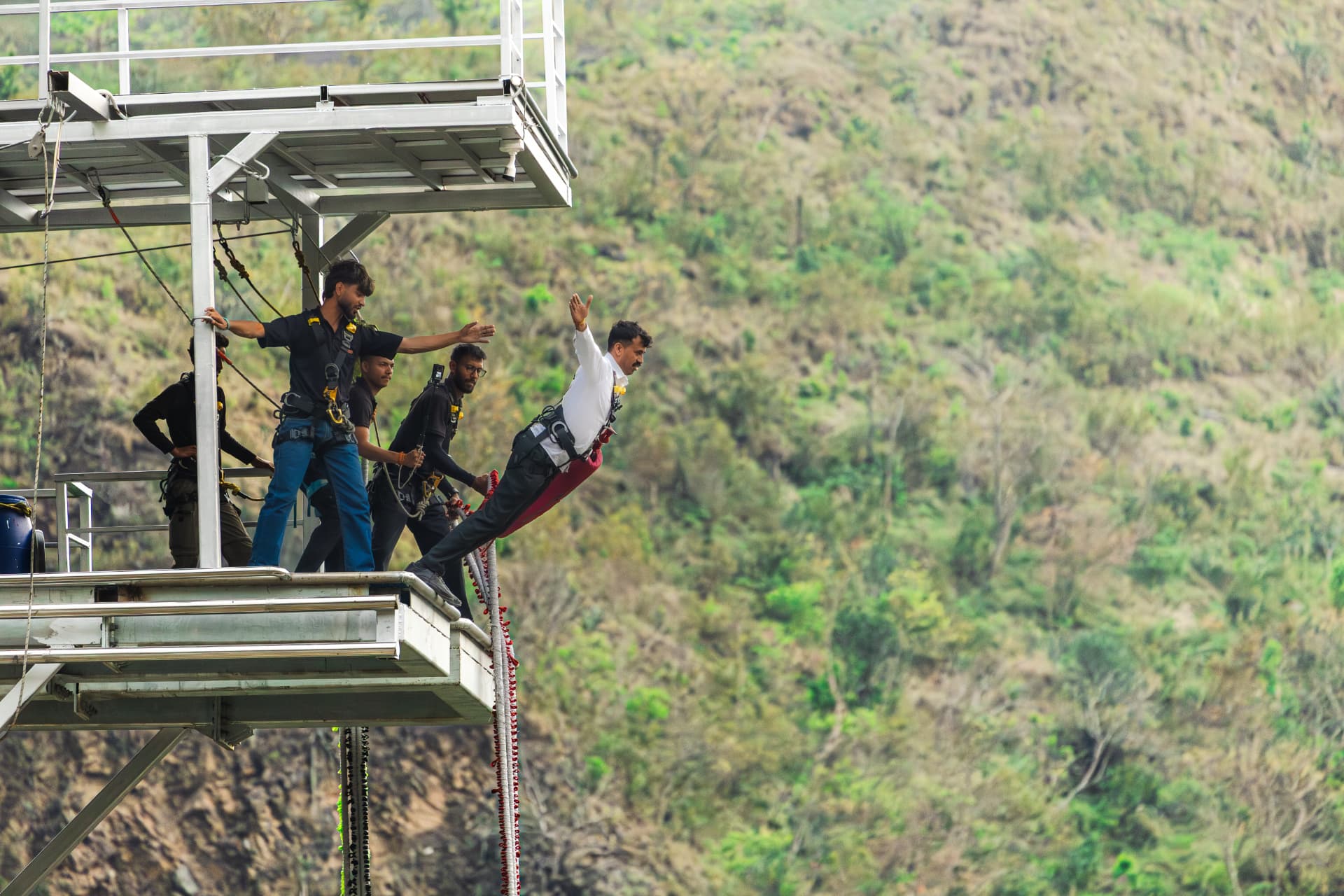 Jumper free falling on the bunjee cord in Rishikesh